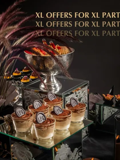 Our festive delivery menu is perfect for XL parties. This image highlights our Tiramisu dessert cups, part of our bulk order offerings for Diwali and other celebrations.