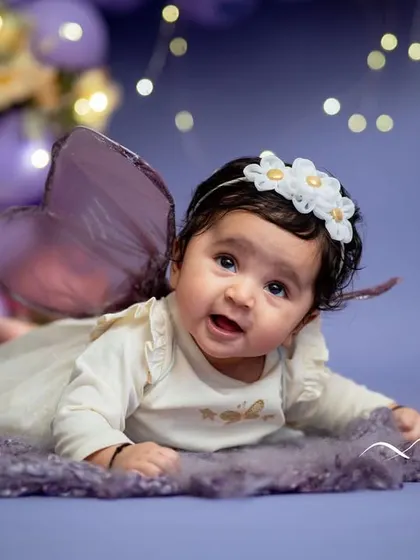 Tummy time for the tiniest fairy. Even our youngest clients can join in the magical fun with our adorable fairy-themed sitter sessions.