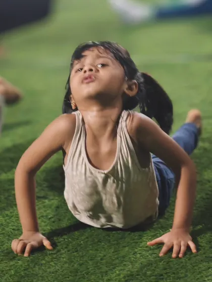 This little champion gives it her all in the cobra pose, showing the kind of effort and spirit we love to see in our Cali Kids.