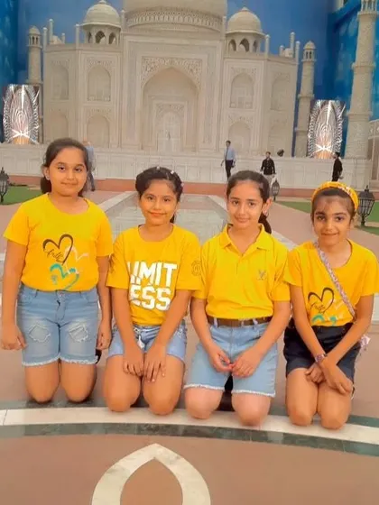 Our girls' team posing for a photo during an outdoor event.