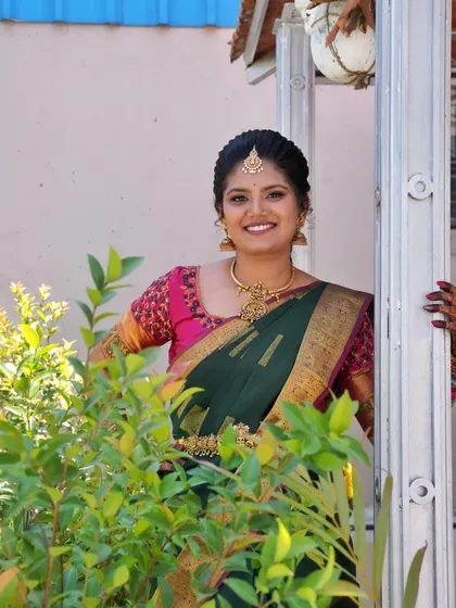 A lovely candid shot of the bride. The makeup is designed to look fresh and beautiful in natural daylight, perfect for a daytime wedding ceremony.