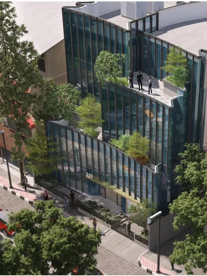 An aerial view of a proposed commercial building in Koramangala, with a playful, curved glass facade that creates a series of stepped terraces. These outdoor spaces are designed as green extensions of the indoor offices.