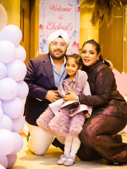 A lovely family portrait in front of the birthday decor. We make sure to capture your family against the beautiful backdrop you've created.