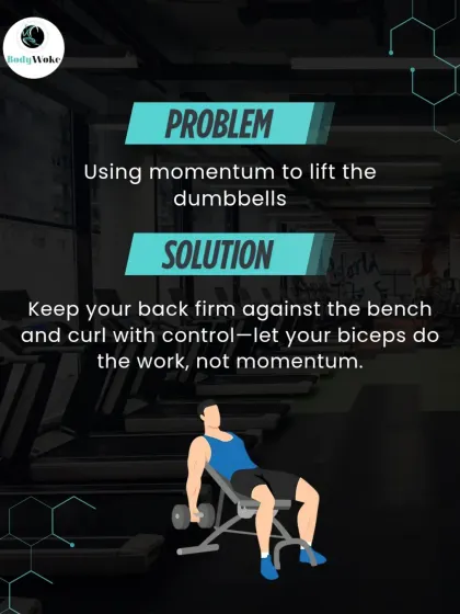Problem: Using momentum to lift the dumbbells. Solution: Keep your back firm against the bench and curl with control. Let your biceps do the work.
