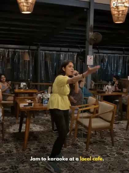 Jamming to karaoke at a local cafe in Gokarna. The fun does not stop when the sun goes down. Our evenings are filled with music, laughter, and creating our own entertainment.