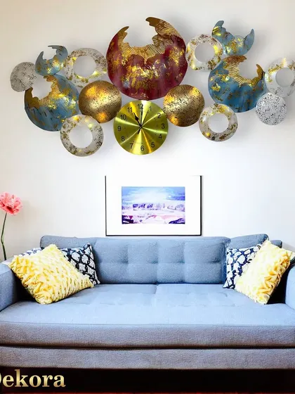 This elegant wall clock is a work of art, perfect for hanging above a sofa.