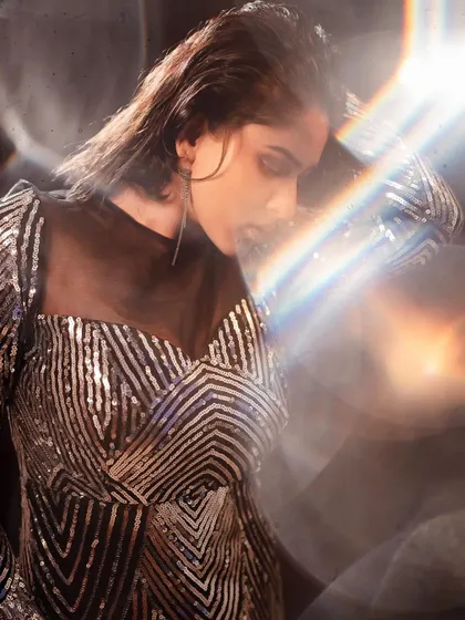 Using a prism to bend the light, we added an ethereal, rainbow-like flare to this fashion shot. It’s a creative technique to make a glamorous portrait even more eye-catching.