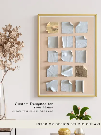 This framed texture piece with gold leaf accents shows how art can transform a space. It was custom-designed to add a unique story to a client's home.