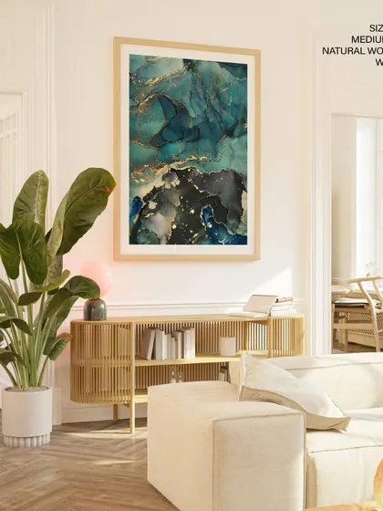 Make a bold statement with this sea green and gold fluid ink abstract painting. The dynamic swirls of color, protected by a glass finish and a natural wood frame, bring a luxurious and contemporary energy to any room.