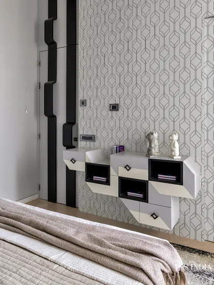 Who said storage can’t be a statement? This geometric, monochrome console was designed to be both a functional storage unit and a piece of sculptural art, proving that utility can be beautiful.