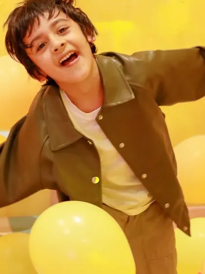 Feeling free and joyful in a sea of balloons. Sometimes the simplest things bring the biggest smiles.