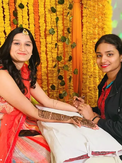 A sweet moment captured with a client during her mehndi session. I cherish these connections and the trust my clients place in me.
