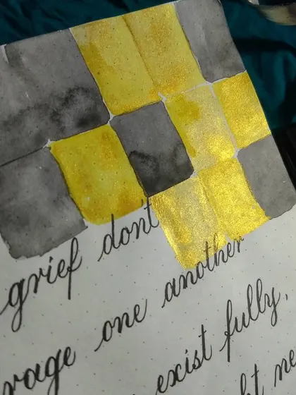 Another detail shot of the gold and grey watercolor pattern. The way the colors bleed into each other creates a beautiful, organic texture.