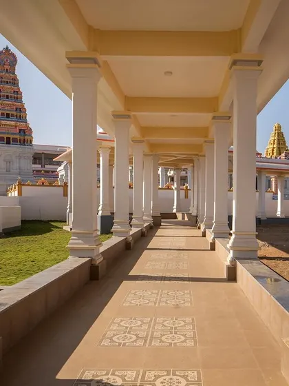 I believe architecture should guide the user's experience. This colonnaded walkway at the Shiva Temple complex is part of the 'parivarthana patha' or transitional path, designed to create a sense of peace and anticipation as devotees move through the sacred space.