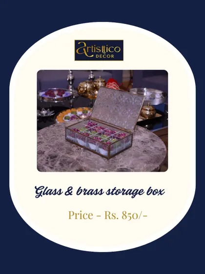 A versatile glass and brass storage box, perfect for organizing small trinkets or as a beautiful container for wedding favors like supari and mishri.