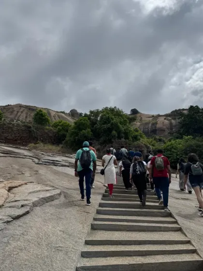 The ascent at Uttari Betta includes these iconic rock-cut steps. It is a challenging yet rewarding part of the trek that encourages team members to support and motivate one another.