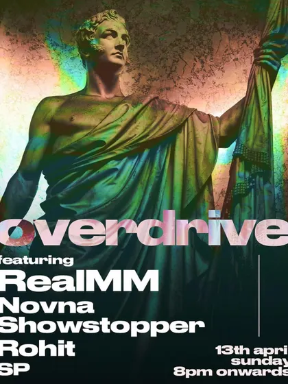 The poster for 'Overdrive' at Opa! Mumbai. The classic statue with a modern, glitchy color effect is a great blend of old and new.