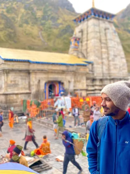 A quiet moment of reflection at the Kedarnath temple, a place that radiates peace and timeless energy.