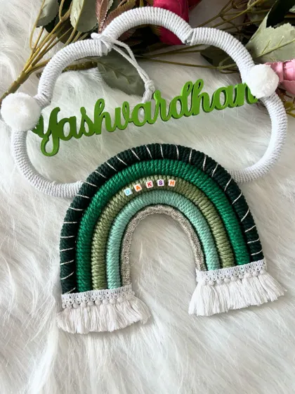 A clear and bright photo of the 'Yashwardhan' name hanging, perfect for seeing all the fine details.