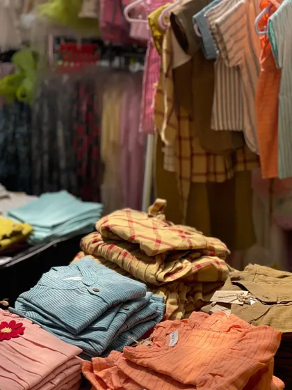 I handpick every brand to ensure you find beautiful, high-quality items, like this colorful collection of children's apparel. You'll discover unique textures and prints from local designers, perfect for adding something special to your child's wardrobe.