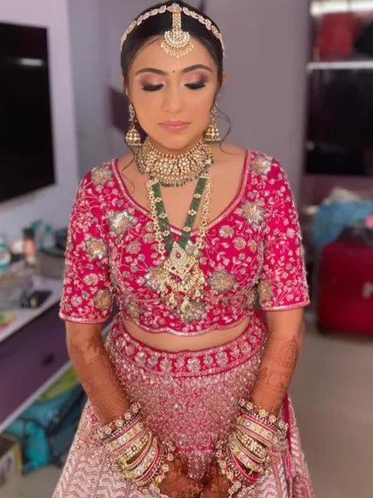 The bride looks absolutely beautiful and ready for her wedding day.