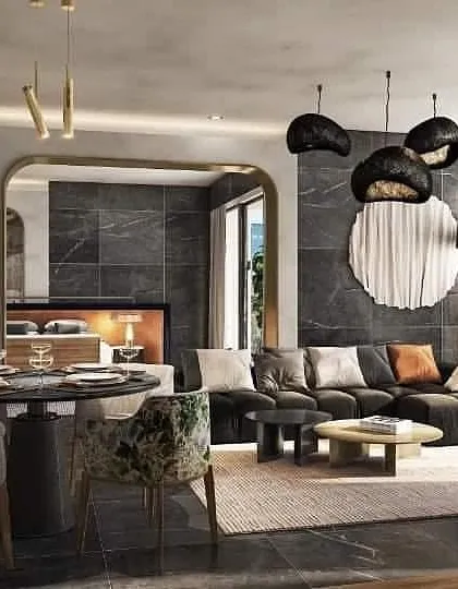 A sophisticated living and dining area with dark marble floors and walls. The rendering highlights the dramatic lighting fixtures and plush, comfortable furniture.