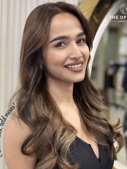 Vibrant hues and bold moves. This gorgeous light brown color with soft waves is a perfect example of a stylish and confident look that enhances natural beauty.