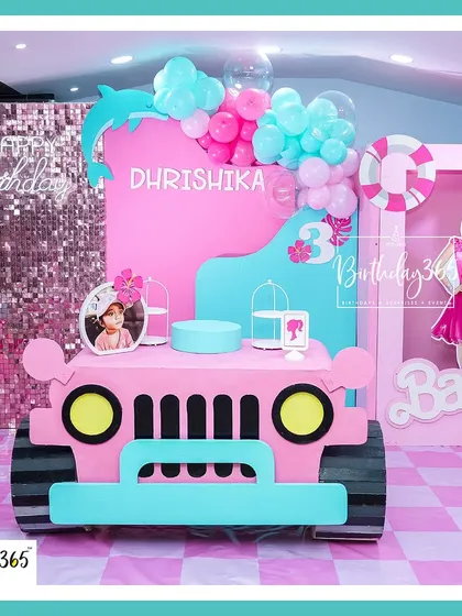 We designed this Barbie-themed party with all the pink and glam a girl could wish for. The centerpiece was a custom-built pink jeep dessert table, set against a sparkling sequin backdrop and fun, tropical-inspired decor.