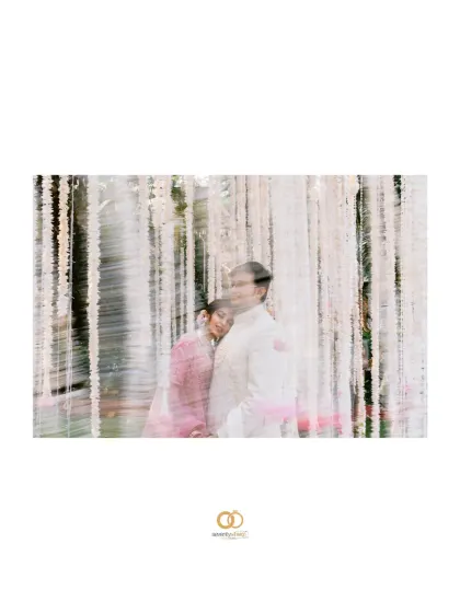 An artistic double exposure, blending the couple's portrait with the delicate floral decor, creating a dreamy, ethereal image.