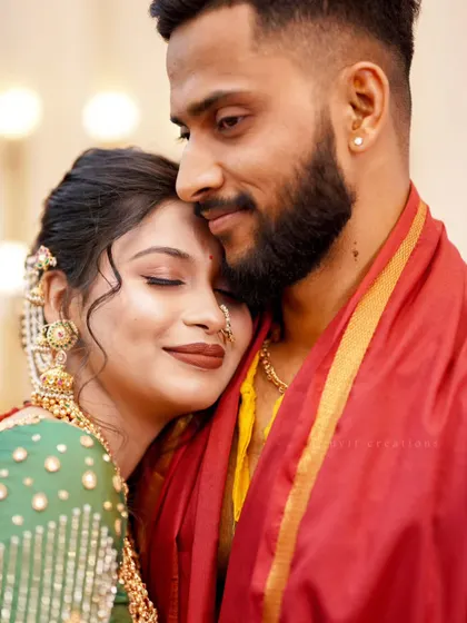A tender moment of comfort and love, this close-up captures the deep emotional bond between the couple.