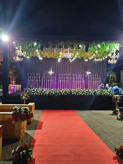 A look at the grand stage setup for a destination wedding sangeet. The lighting and floral decor were just breathtaking.