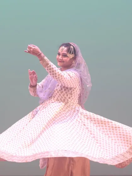 A Kathak dancer captured mid-swirl during her performance at SparkLights 2024. The movement showcases the grace, fluidity, and expressive joy inherent in this classical Indian dance form.
