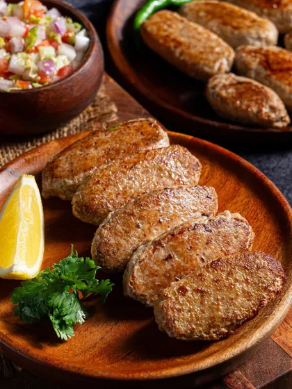 Food photography for a cloud kitchen specializing in kebabs. We focus on making the food look succulent and perfectly cooked for delivery app menus.