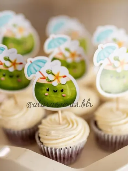 Adorable coconut-themed cupcakes for a "Coco Baby" shower. Each cupcake is topped with a cute, smiling coconut character, adding a sweet and thematic touch to the dessert table.