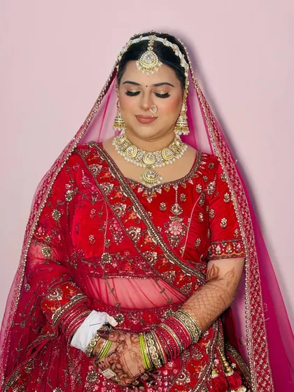 A three-quarter profile view, highlighting the contour and blush placement. In my course, you'll learn how to apply makeup for different face shapes.