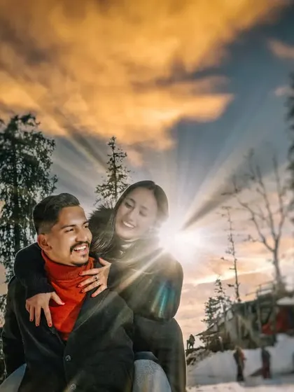 A fun and candid moment from a pre-wedding shoot in the snow. Capturing your genuine laughter and playful interactions is just as important as the posed, epic shots.
