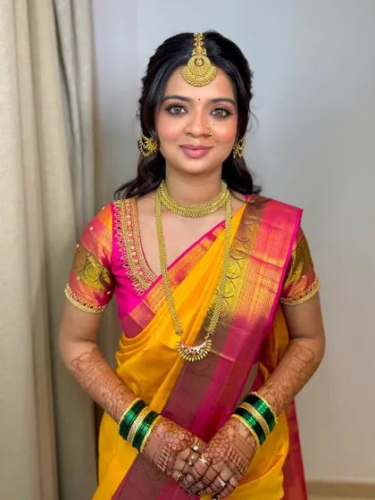 It is always in the eye makeup. For this beautiful bride, I created a stunning look with gorgeous nude shades and finely detailed eye makeup, paired with a classic hairstyle and accessories.