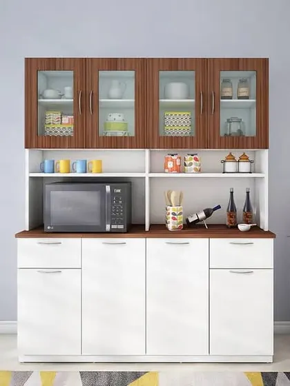 A traditional and highly functional crockery unit with space for a microwave. The combination of glass-fronted upper cabinets and closed lower cabinets provides a variety of storage options.