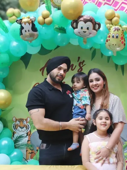 A fun family photo at a jungle-themed birthday party. I love incorporating your party's theme into the portraits.