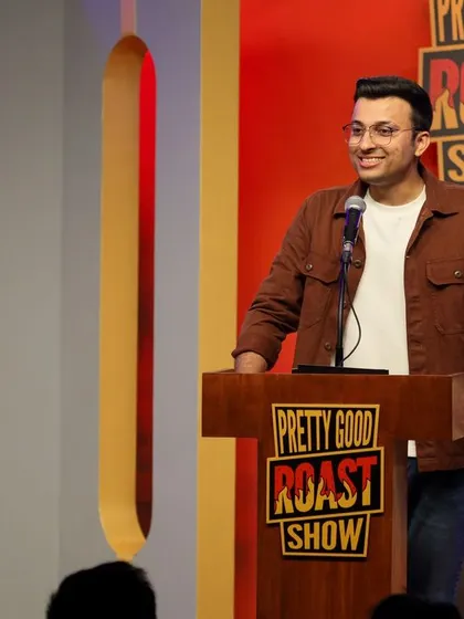 A collection of shots from the Pretty Good Roast Show, showcasing various comedians and moments from the event.