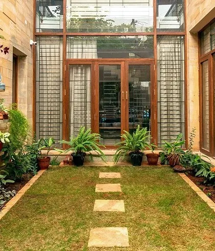 We designed this internal courtyard for the Chatty Residence to act as the green heart of the home. The space is lined with sandstone and filled with plants, providing a tranquil view and improving natural ventilation for the surrounding rooms.