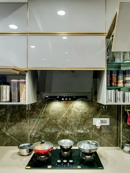 Lift-up cabinets with glass shelves, providing both storage and display space.