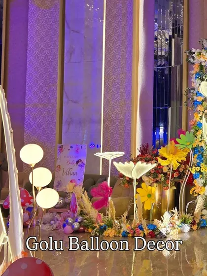 Another angle of the whimsical decor, showing how the different light-up elements and props come together to create a magical scene.