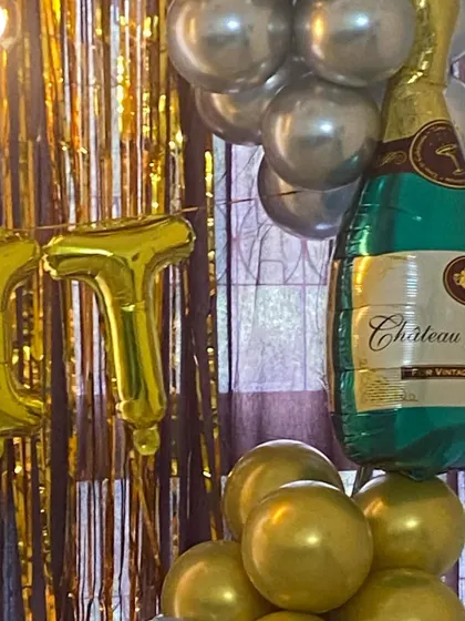 A close-up of the champagne bottle balloon, showing the fun details that can be added to any decor.