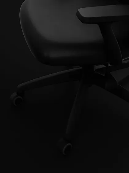 This shot highlights the sturdy five-star base and smooth-rolling casters of our task chair. This foundation provides both stability and effortless mobility, allowing you to move around your workspace with ease.