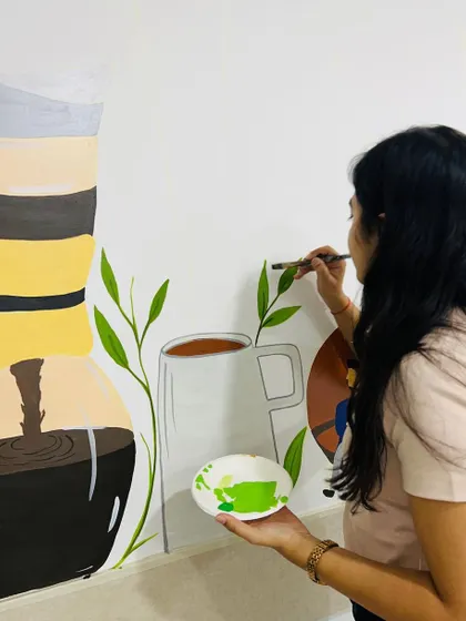 Adding green leaves to the coffee-themed illustration. It's these little touches of nature that bring freshness and life to the design.