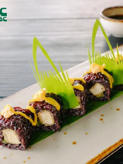 Freshly made sushi from our Silk Cotton Tree garden. This roll features black rice for a unique twist on a classic.