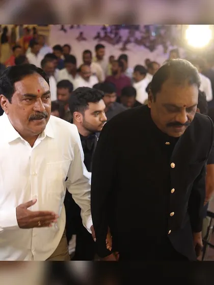 A distinguished guest arriving in our classic black Jodhpuri suit. This timeless piece is perfect for adding a touch of Indian royalty to a formal event.