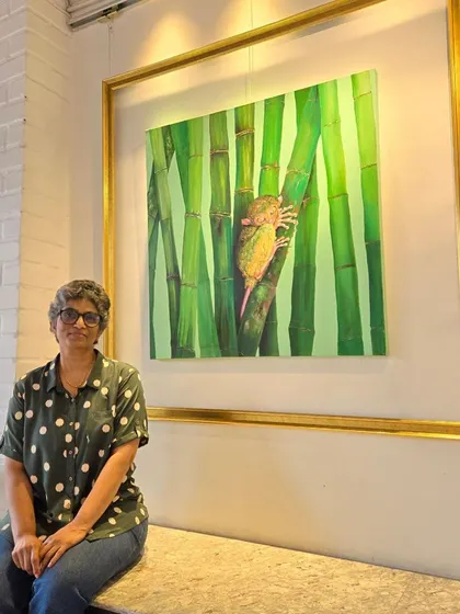 We love connecting our clients with the creators behind the art. Here are some moments from our gallery, featuring talented artists like Isha Valentine and happy visitors exploring our exhibitions.