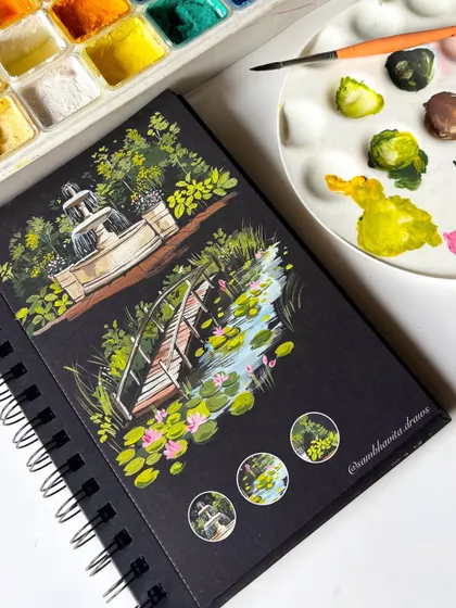 The completed two-page spread in my black sketchbook, featuring the fountain and the lily pond bridge. It feels like a walk through a peaceful, magical garden.
